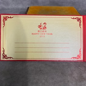 A FINE 5 MILLION DINARA BILL AND GOLD COMMEMORATIVE COINS