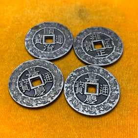 GROUP OF FOUR LUCKY COIN