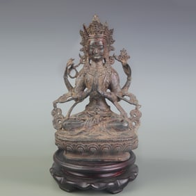 GILT BRONZE FOUR-ARMED GUANYIN STATUE