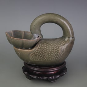 A FINE CELADON COLOR GLAZED PORCELAIN CANDLESTICK