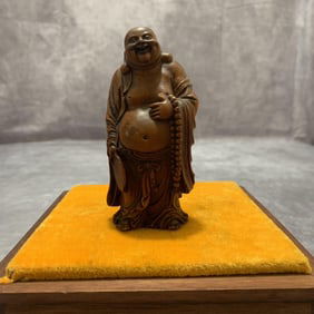 A FINE BOXWOOD MADE MAITREYA BUDDHA FIGURE