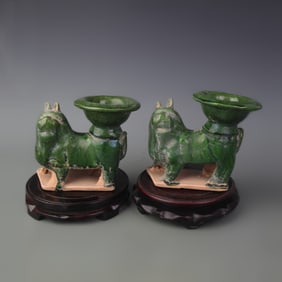 PAIR OF GREEN GLAZE POTTERY CANDLESTICKS