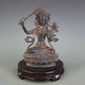 A FINE BRONZE MANJUSHRI BODHISATTVA STATUE