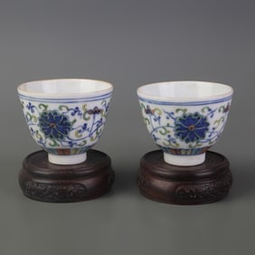 PAIR OF BLUE AND WHITE FLORAL PATTERN SMALL PORCELAIN BOWLS