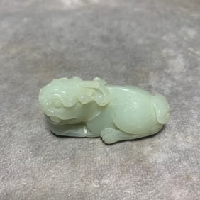 HETIAN GREENISH-WHITE JADE PENDANT OF MYTHICAL LION