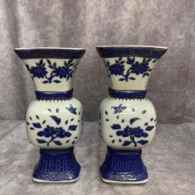 PAIR OF BLUE AND WHITE FLOWER PATTERN WALL FLOWER VASE