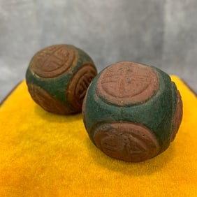 PAIR OF CHINESE HERBAL AND AGARWOOD MADE HAND PLAYING BALL