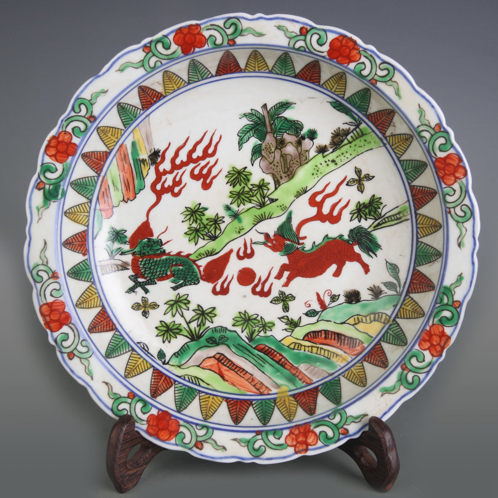 WUCAI PLATE WITH AUSPICIOUS BEASTS: Ming Dynasty Style Wan Li Period; Diameter: 8.7 inch; High: 1.8 inch