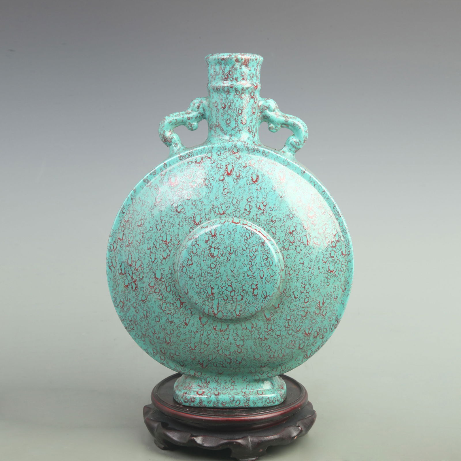 LIGHT GREEN COLOR GLAZED MOON STYLE PORCELAIN FLASK: Qing Dynasty Qian Long Period; High:13.5inch; Width: 10inch