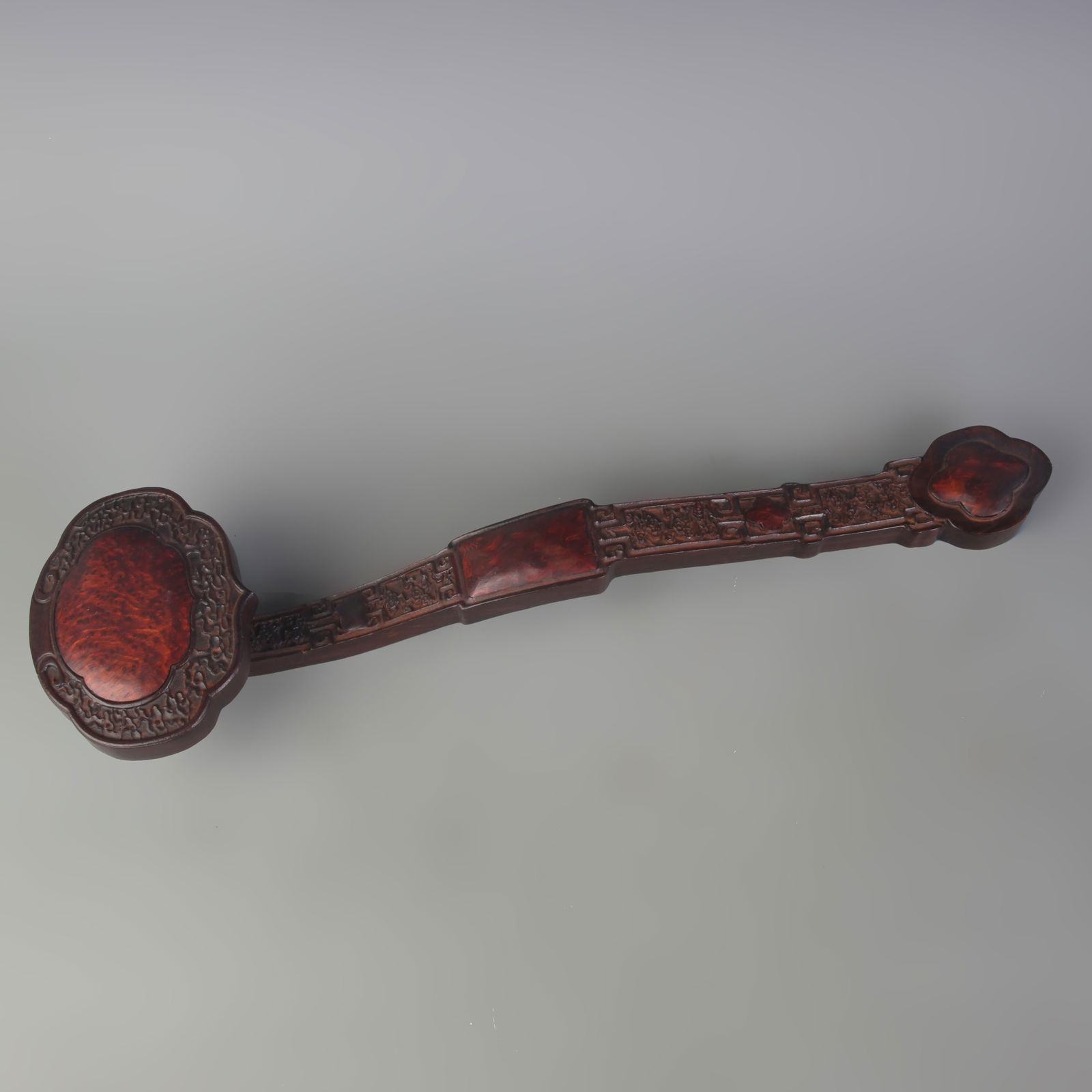 A FINE ROSEWOOD INLAID SHADOW WOOD RUYI: Qing Dynasty; Long: 17.0 inch;