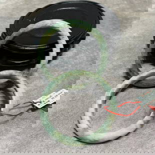 GROUP OF TWO JADEITE BRACELETS: Modern; High: 0.5 inch; Diameter: 2.2 inch;