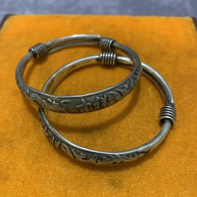 PAIR OF WHITE BRONZE BRACELETS