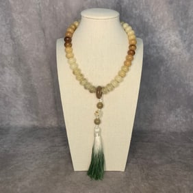 A FINE BODHI SEED MADE PRAYER BRACELET