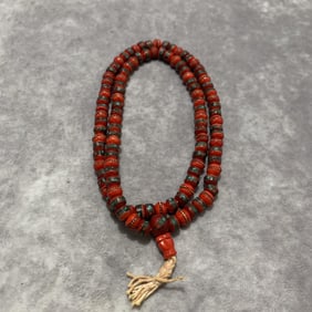 A FINE PUTI SEED NECKLACE