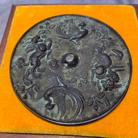 SONG DYNASTY BRONZE MIRROR WITH AUSPICIOUS BEAST AND PHOENIX MOTIF