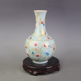 FAMILLE ROSE CELESTIAL GLOBE VASE WITH BIRD-AND-FLOWER DESIGN