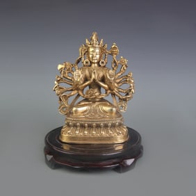 A BRONZE THOUSAND-ARMED AVALOKITESVARA STATUE