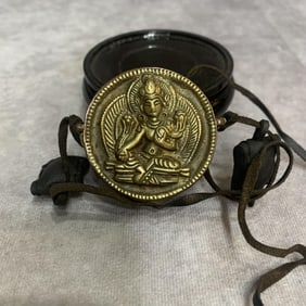 A FINE BRONZE TIBETIAN GAU PENDANT