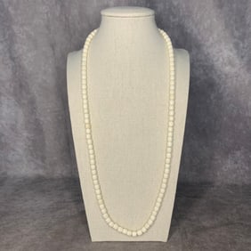 A FINE BUFFALO BONE MADE NECKLACE
