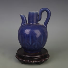 A FINE BLUE GLAZED PORCELAIN EWER