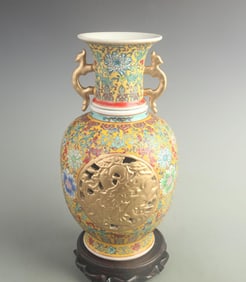 YELLOW-GROUND DOUBLE-SIDED CARVED DRAGON AND PHOENIX PORCELAIN VASE