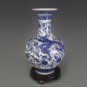 A FUBE BLUE AND WHITE FLORAL DRAGON PORCELAIN VASE