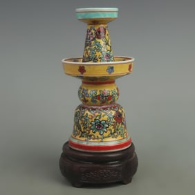 A FINE FAMILLE ROSE YELLOW GROUND PORCELAIN CANDLESTICKS