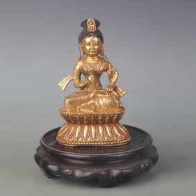 A FINE BRONZE GILT BRONZE GUANYIN STATUE
