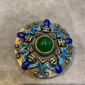 A FINE WHITE BRONZE PENDANT WITH GEM STONE