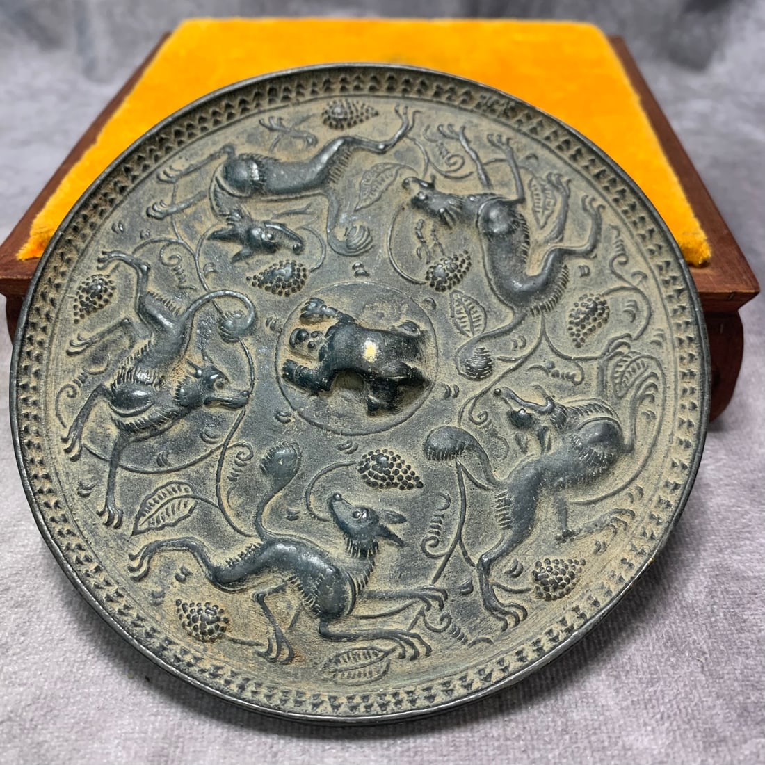 A FINELY CARVED SONG DYNASTY BRONZE MIRROR (1 of 7)