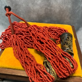 TIBETAN BRAIDED CORAL NECKLACE WITH OX BONE
