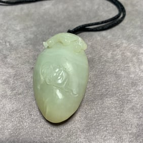 HETIAN GREENISH-WHITE JADE HAND PIECE WITH LONGEVITY SYMBOLS
