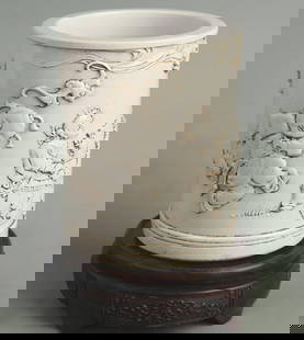 WANG BINGRONG'S CARVED CHILD BLESSING PATTERN PORCELAIN PEN HOLDER: Qing Dynasty; High: 5.50 inch; Diameter: 4.30 inch