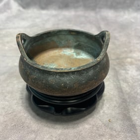 A FINE BRONZE THREE FOOT BRIDGE HANDLED CENSER