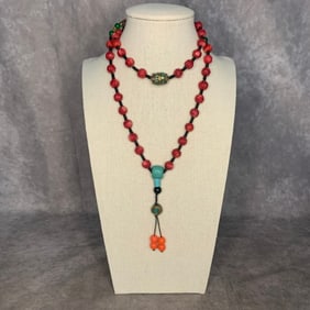 A FINE RED CORAL AND TURQUOISE STONE TIBETIAN NECKLACE