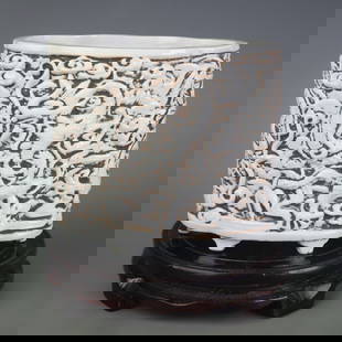 WHITE PORCELAIN CARVED DRAGON PATTERN BRUSH POT: Qing Dynasty; High: 5.8 inch; Width: 6.3 inch; Wang Bing Rong Mark
