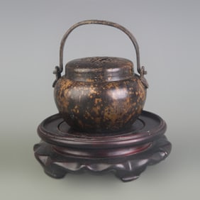 A FINE BRONZE HAND WARMER