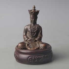 A SMALL BRONZE BUDDHA STATUE