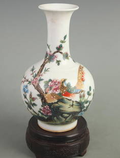 ENAMEL COLOR GROUND FLORAL AND BIRD PATTERN PORCELAIN VASE: Qing Dynasty Qian Long Period; High: 8.50 inch; Width: 4.80 inch;