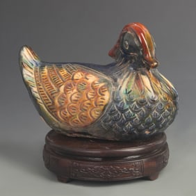 A FINE TRI-COLORED MANDARIN DUCKS POTTERY FIGURINE