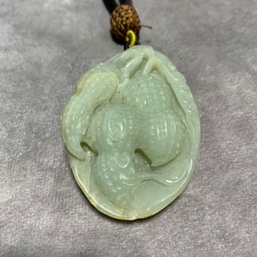 HETIAN GREENISH-WHITE JADE PENDANT OF CARVED PEANUT
