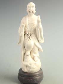 DEHUA PORCELAIN FIGURINE OF TIE GUAI LI, ONE OF THE EIGHT IMMORTALS