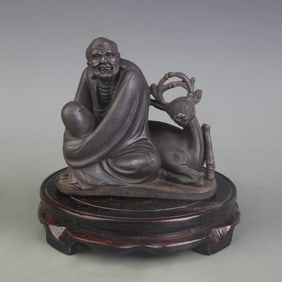 A FINE CAST IRON ARHAT STATUE