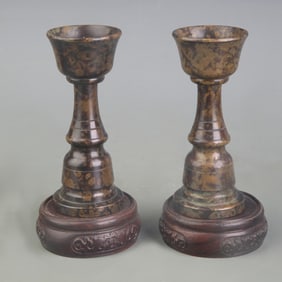 PAIR OF BRONZE CANDLE HOLDERS