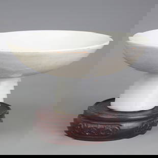 WHITE-GLAZED STEM BOWL WITH INCISED DRAGON PATTERN: 20th Century; Diameter: 6.1 inch; High: 3.1 inch