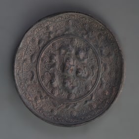A FINE SEA CREATURE PATTERN BRONZE MIRROR