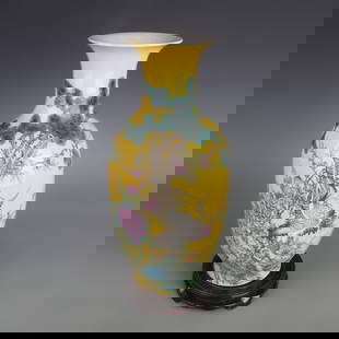 FAMILLE ROSE YELLOW GROUND FLOWER AND BIRD PORCELAIN VASE: Qing Dynasty; Width: 7.3 inch; Diameter: 5.6 inch; High: 16.8 inch