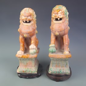 PAIR OF TRI-COLOR GLAZED LION POTTERY FIGURINES
