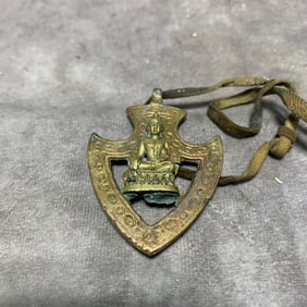 SMALL GILT BRONZE TIBETAN BUDDHIST PENDANT