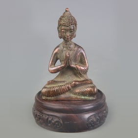 A SMALL BRONZE SHAKYAMUNI BUDDHA STATUE